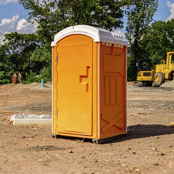 how often are the portable restrooms cleaned and serviced during a rental period in Goldfield